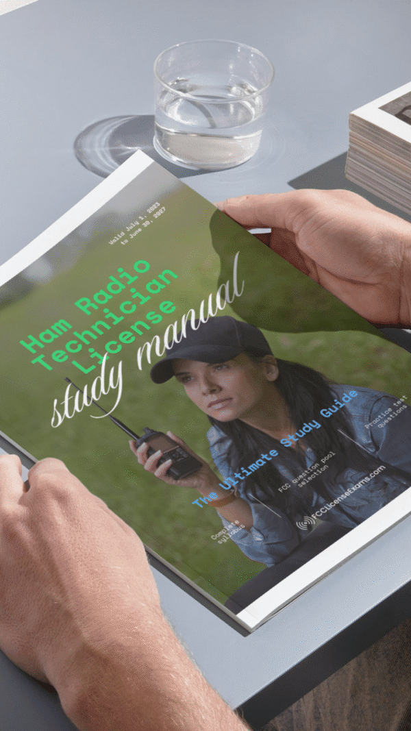 a person's hands holding the Ham Radio Technician License Study Manual