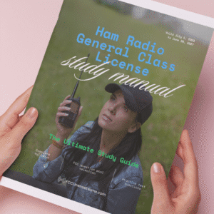 a woman's hands holding the ham radio general license manual